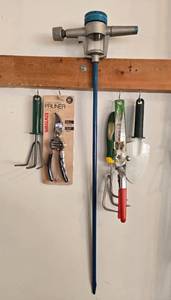 lot 112 image: Set of Garden Tools Pruner, Grass Shears, Trowel, and Watering Wand