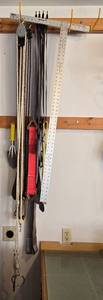 lot 113 image: Collection of Various Ropes and Straps on Rack - Multi-Use Accessories