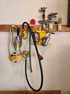 lot 114 image: Assortment of Gardening Tools and Accessories - Nelson Hose Nozzle and Sprinkler Parts