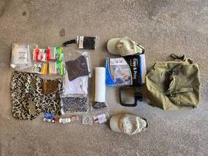 lot 135 image: Assortment of Fishing and Camping Gear - Camo Vest, Supplies, Hats, and More