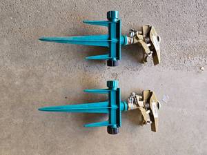 lot 136 image: Pair of Gilmore Lawn Sprinklers - Adjustable Spray, Heavy Duty