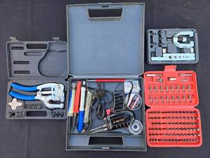lot 555 image: Tool Kit with 100-Piece Security Bit Set, Pliers, and Extractors