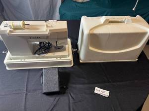 lot 254 image: Singer Sewing Machine with Accessories - Model 357 Knit & Sew