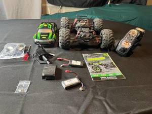 lot 293 image: Altair Power Pro RC Truck with Controller, Accessories, and KitchenAid SlicerShredder Attachment