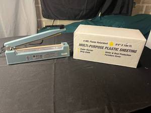 lot 335 image: Impulse Sealer with 4 Mil Flame Retardant Multi-Purpose Plastic Sheeting - 84 x 100 ft