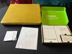 lot 379 image: CenturyLink High-Speed Internet Modem and Accessories & Lap Top Pillow