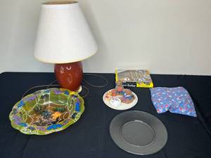 lot 380 image: Assortment of Vintage Home Decor Items - Includes Lamp, Decorative Plates, Stuffed Pillow, and Books