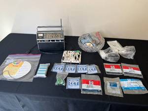 lot 391 image: Assortment of Vintage Original GM Parts and Accessories with Airline Radio