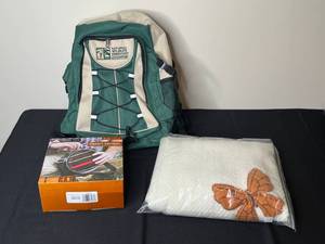 lot 242 image: Outdoor Gear Set National Wildlife Federation Backpack, Ozark Trail Desert Canteen, and Butterfly Blanket