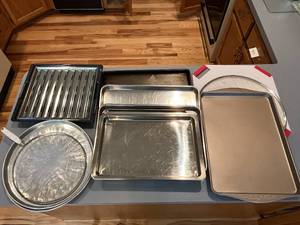 lot 465 image: Set of Various Baking Trays, Cutting Board and Metal Mesh Splatter Guards