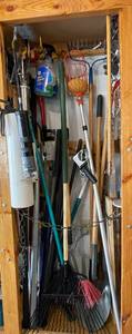 lot 52 image: Shovels  Rakes  Axe  Chains  Grease Guns and More Everything in Picture Goes.