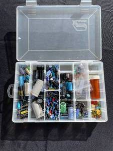 lot 43 image: Assortment of Electronic Components - Capacitors, Resistors, and More in Organizer