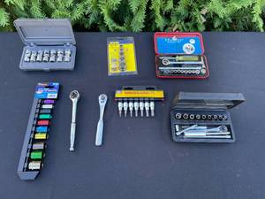 lot 556 image: Assortment of 10 Piece and Various Socket Wrench Sets - Including Craftsman and Irwin