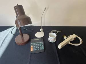 lot 411 image: Collection of Desk Items - Calculator, Lamps, Power Strip, and Decorative Small Plant Pot