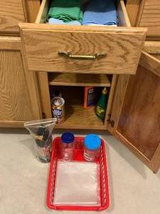 lot 415 image: Assortment of Kitchen Towels and Cleaning Supplies - Basket Included - contents only furniture not included