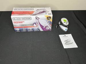 lot 414 image: BlackDecker Professional Steam Iron with Extra Long Cord and Steamfast Home & Away Steamer