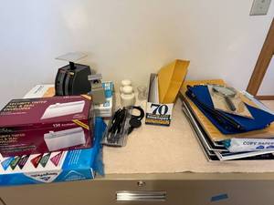 lot 500 image: Assortment of Office Supplies - Envelopes, Notebooks, Magnifying Glass, and More