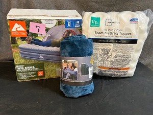 lot 7 image: Opened Ozark Trail Twin Air Mattress, Foam Mattress Topper, & IndoorOutdoor Waterproof Throw