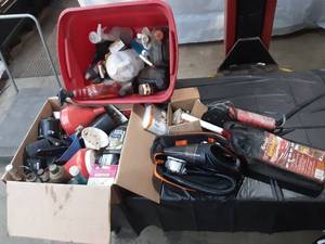 lot 60 image: Large Assortment of Garage Items Oil, Car cleaning items, Funnels