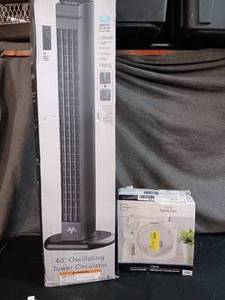 lot 15 image: 40 Oscillating Tower Fan and 9-inch Table Fan.