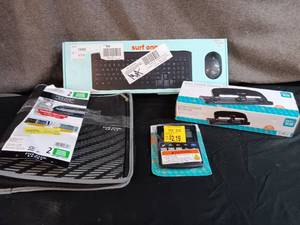lot 18 image: Assortment of Office Supplies Surf Onn Keyboard & Mouse, 3 Ring Binder, Low Force Hole Punch, & Calculator