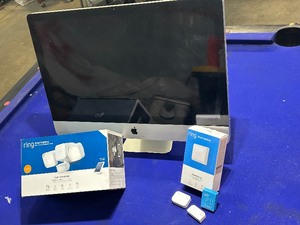 lot 44 image: Ring smart lighting and sensors, apple computer