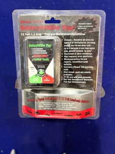 lot 92 image: Unopened Model 12117 BatteryMINDer Plus- Battery Charger