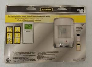 lot 20 image: Defiant  Daylight Adjusting Indoor Digital Timer & Motion Sensor - NEW