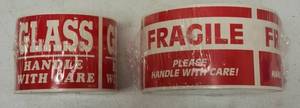 lot 34 image: Shipping Labels (2) Boxes of - Glass Handle with Care & (1) Box of Fragile Please Handle with Care