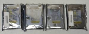 lot 65 image: Western Digital  (4) Hard Drives - 1.0 TB