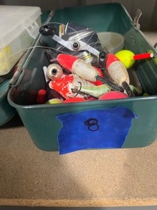 tackle box with tackle and reel