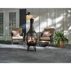 lot 31 image: Hampton Bay 55.5 in. Outdoor Chimenea  Customer Returns See Pictures