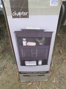 lot 101 image: Wood Bathroom wall cabinet in origi...