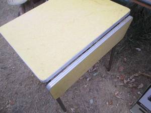 lot 102 image: 1970s yellow formica drop leaf tab...