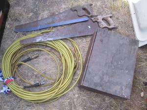lot 150 image: 14in air hose, Vintage hand saws p...