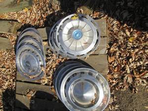 lot 159 image: Misc lot of Vintage Chevy hubcaps...