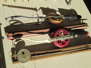 lot 172 image: Ice fishing tip--ups and locking re...