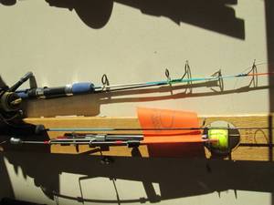lot 173 image: Fishing tip--up with ice fishing po...