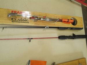 lot 175 image: Hardwood tip-up and ice fishing rod...