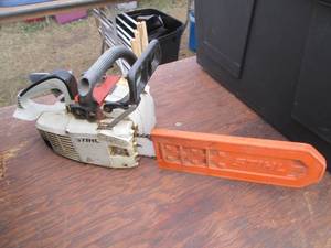 lot 21 image: Stihl 009 gas powered chainsaw...