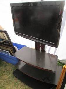 lot 53 image: Panasonic 32in flat screen TV mount...