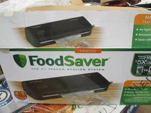 lot 80 image: Food saver vacuum sealing machine...