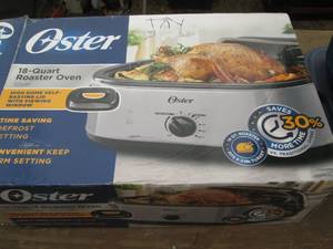 lot 81 image: New Oster 18-qt Roaster Oven with S...