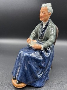 lot 237 image: ROYAL DOULTON Porcelain Figurine - The Cup of Tea