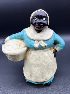 lot 256 image: Vintage Black Americana - Cast Iron Mammy Bank - Blue Dress