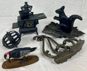 lot 151 image: Cast Iron Collection - Squirrel Nutcracker,  Bird Door Knocker, Mini Stove, mini Cauldron, 3 Hooks, Cast String Holder