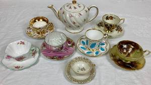 lot 156 image: 7 Teacups & Saucers plus Sadler Teapot