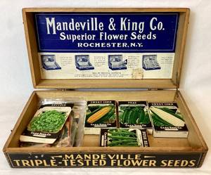 lot 44 image: Mandeville & King Co. Flower Seed Display plus Rockford and Card Seed Co. Packets