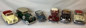 lot 75 image: Collection of 118 Scale Diecast Cars from Danbury Mint, Sun Star, Signature Models, and Maisto