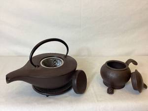 lot 81 image: Chinese Cast Iron Teapot with Cast Mat and Chinese Clay Teapot